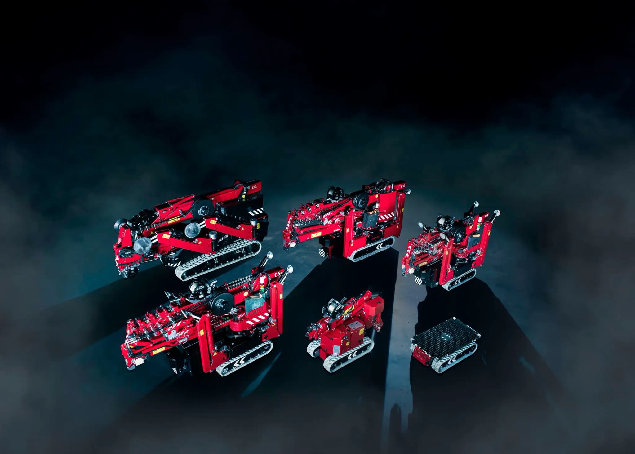 Bild von Hoeflon Kompaktkränen und einem Carrier.